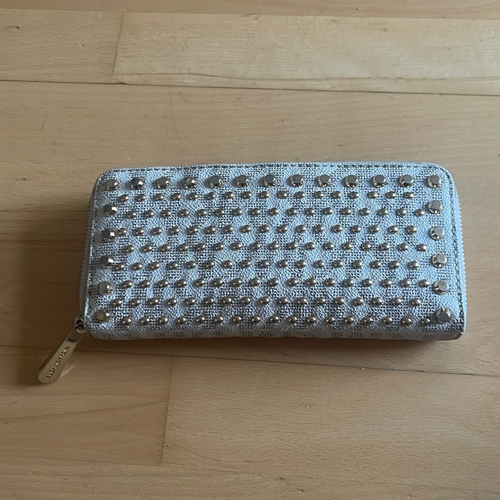 MK monogram gold studded zipper wallet